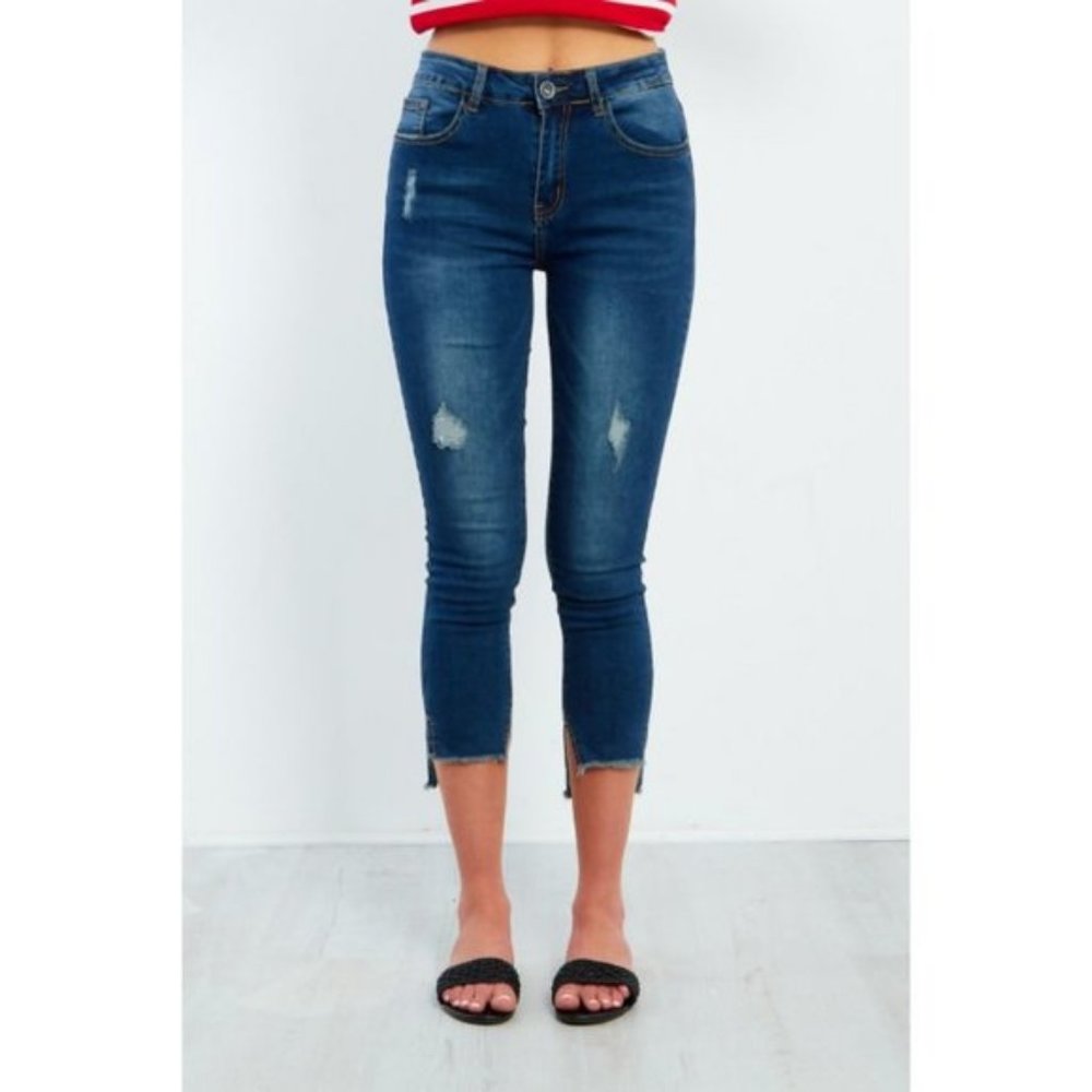 High waisted frayed hem distressed jeans